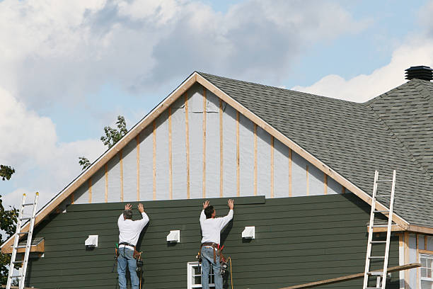 Professional Siding Contractor technician working in Laurel, IN